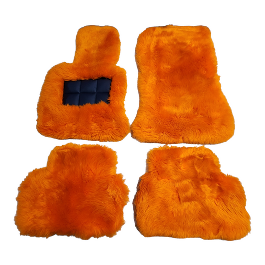 Orange Genuine Sheepskin Floor Mats Shown in Extra Plush Black 2 Inch Thickness
